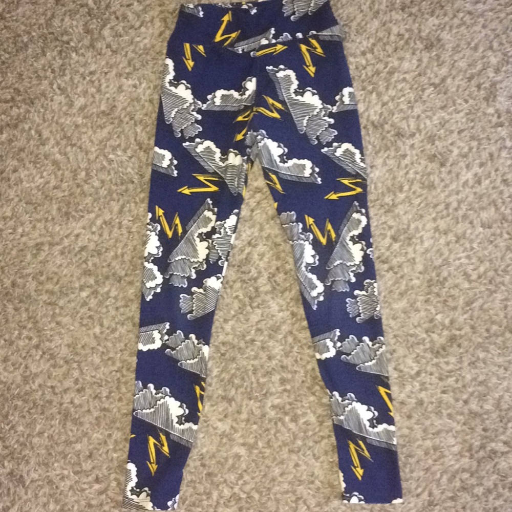 Blue background with lightning bolt leggings